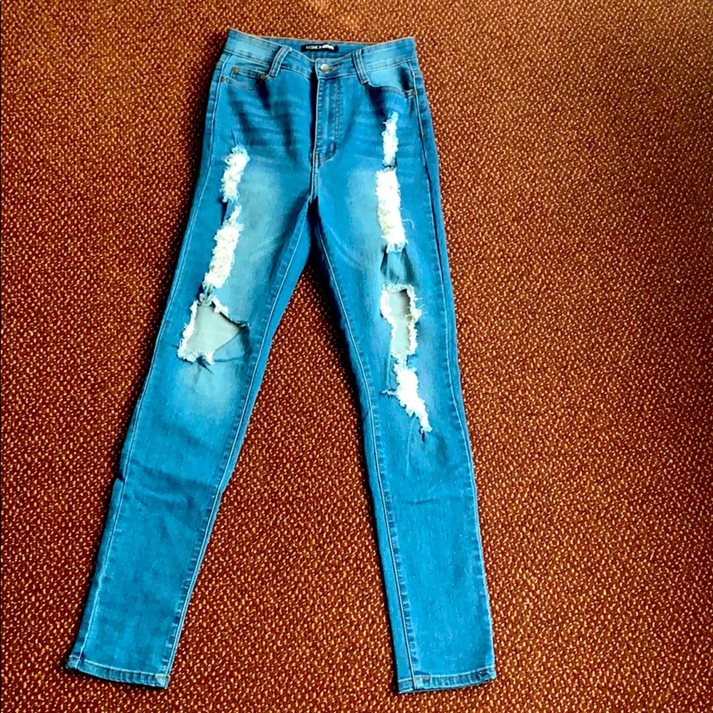 Ripped blue jeans
